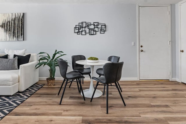 3421 Park Blvd Unit 401, San Diego, CA 92103 - dining room featuring wood finished floors and baseboards