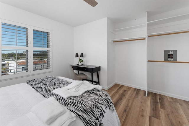 3421 Park Blvd Unit 401, San Diego, CA 92103 - bedroom featuring wood finished floors and baseboards