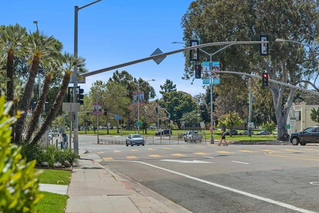 3421 Park Blvd Unit 401, San Diego, CA 92103 - view of asphalt street featuring traffic lights, sidewalks, curbs, and street lights