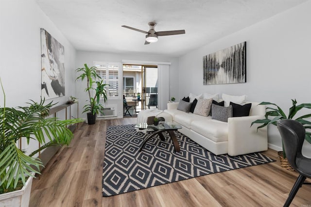 3421 Park Blvd Unit 401, San Diego, CA 92103 - living room with ceiling fan and wood finished floors