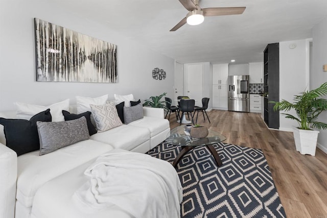 3421 Park Blvd Unit 401, San Diego, CA 92103 - living room with a ceiling fan and wood finished floors