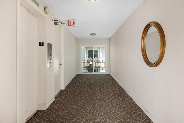 3421 Park Blvd Unit 401, San Diego, CA 92103 - corridor featuring carpet flooring, baseboards, and elevator