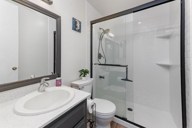 3421 Park Blvd Unit 401, San Diego, CA 92103 - full bathroom with a shower stall, vanity, and toilet
