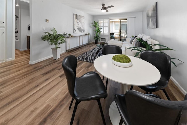 3421 Park Blvd Unit 401, San Diego, CA 92103 - dining space featuring wood finished floors, baseboards, and ceiling fan