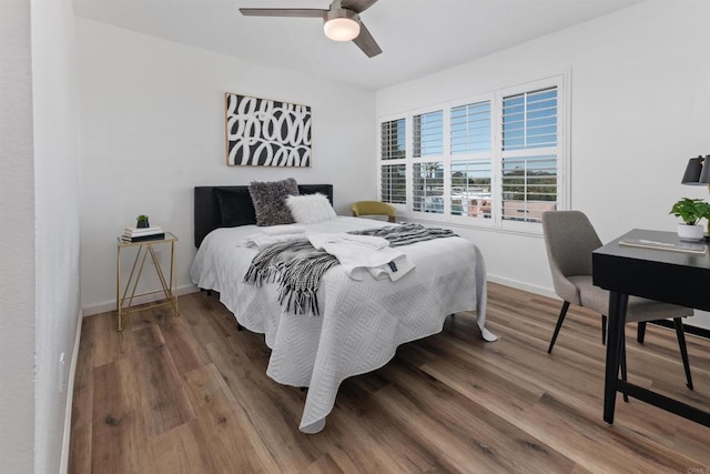 3421 Park Blvd Unit 401, San Diego, CA 92103 - bedroom featuring wood finished floors, baseboards, ceiling fan, and an office area