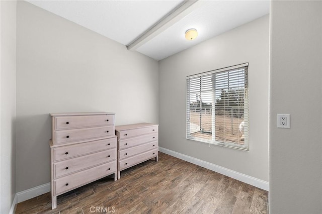 7922 Los Palmas Dr, Oak Hills, CA 92344 - bedroom with baseboards, beam ceiling, and dark wood finished floors