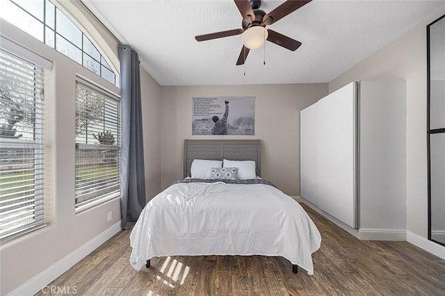 7922 Los Palmas Dr, Oak Hills, CA 92344 - bedroom featuring baseboards, a ceiling fan, and wood finished floors