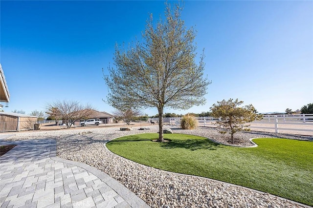 7922 Los Palmas Dr, Oak Hills, CA 92344 - view of yard with fence