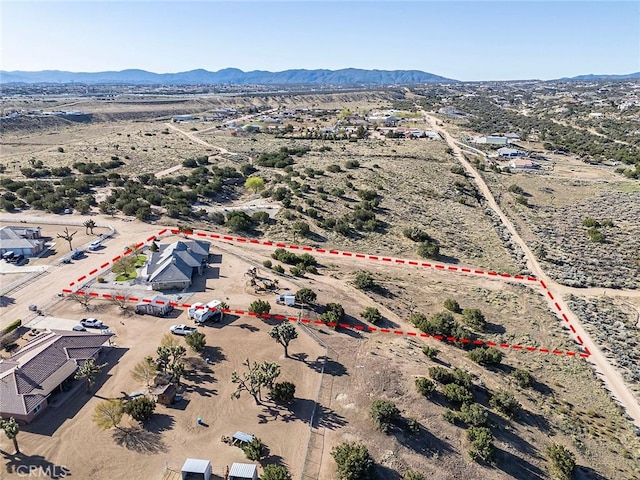 7922 Los Palmas Dr, Oak Hills, CA 92344 - drone / aerial view with a mountain view and view of desert