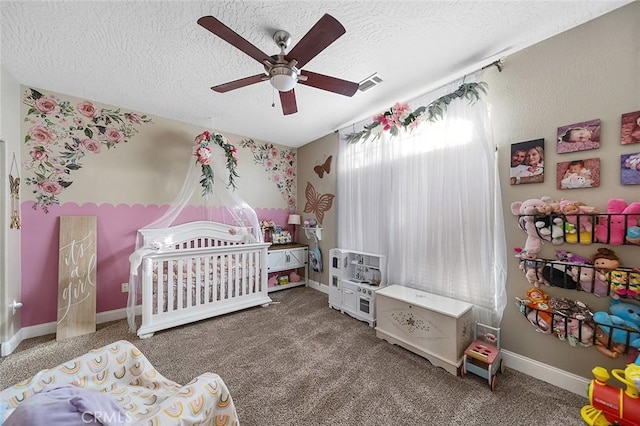 7922 Los Palmas Dr, Oak Hills, CA 92344 - carpeted bedroom featuring a textured ceiling, ceiling fan, baseboards, and visible vents