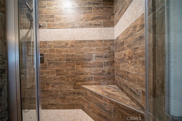 7922 Los Palmas Dr, Oak Hills, CA 92344 - full bathroom featuring a stall shower