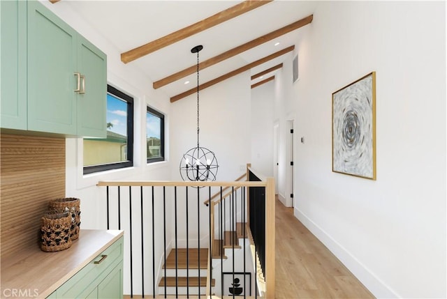 237 Canal St, Newport Beach, CA 92663 - hall featuring a chandelier, an upstairs landing, light wood-style flooring, baseboards, and recessed lighting