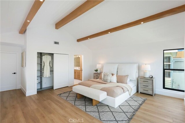 bedroom with recessed lighting, light wood finished floors, visible vents, and vaulted ceiling with beams