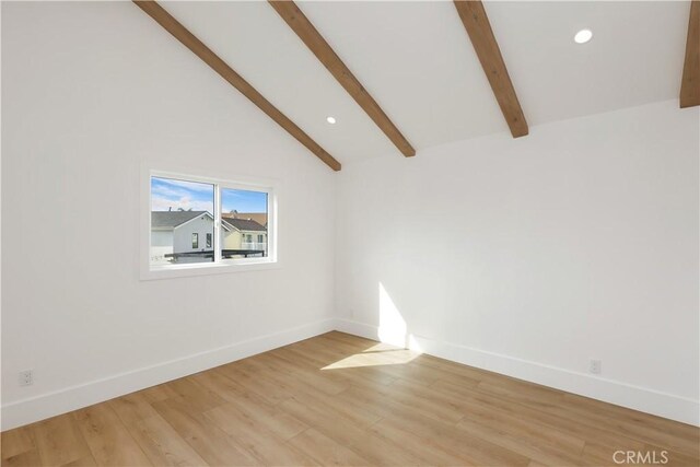 unfurnished room featuring lofted ceiling with beams, recessed lighting, light wood-style floors, and baseboards