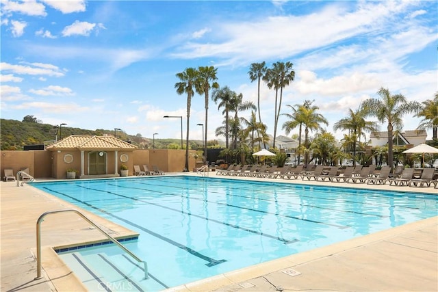pool with a patio area
