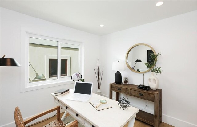 office area featuring baseboards, recessed lighting, and light wood-style flooring