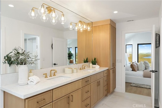 237 Canal St, Newport Beach, CA 92663 - full bath with connected bathroom, double vanity, a chandelier, and recessed lighting