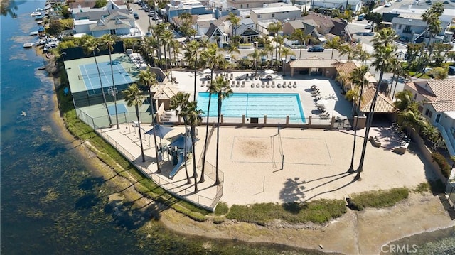 birds eye view of property featuring a residential view and a water view