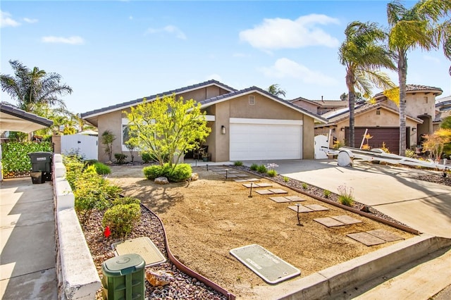 30249 Spray Dr, Canyon Lake, CA 92587 - view of front of property with a garage, stucco siding, concrete driveway, and a tile roof