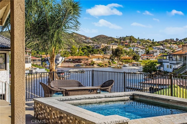 30249 Spray Dr, Canyon Lake, CA 92587 - view of swimming pool featuring an in ground hot tub, a water and mountain view, and a residential view