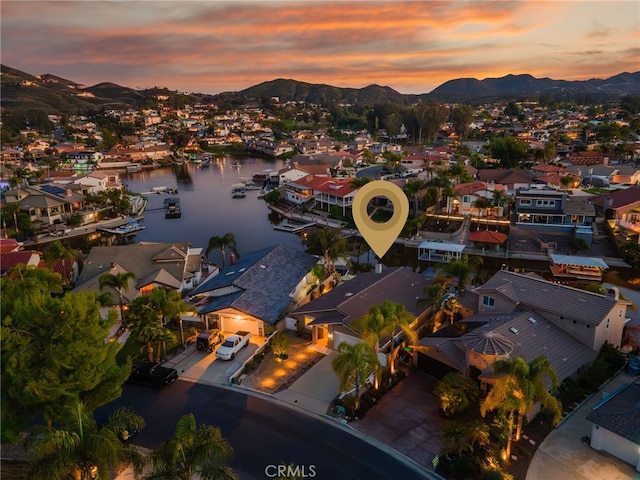 30249 Spray Dr, Canyon Lake, CA 92587 - aerial view at dusk featuring a residential view and a water and mountain view