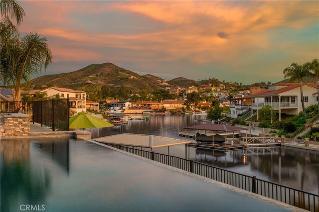 30249 Spray Dr, Canyon Lake, CA 92587 - property view of water featuring a residential view, a mountain view, and a dock