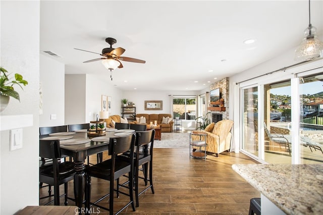 30249 Spray Dr, Canyon Lake, CA 92587 - dining area featuring dark wood-type flooring, visible vents, ceiling fan, and recessed lighting