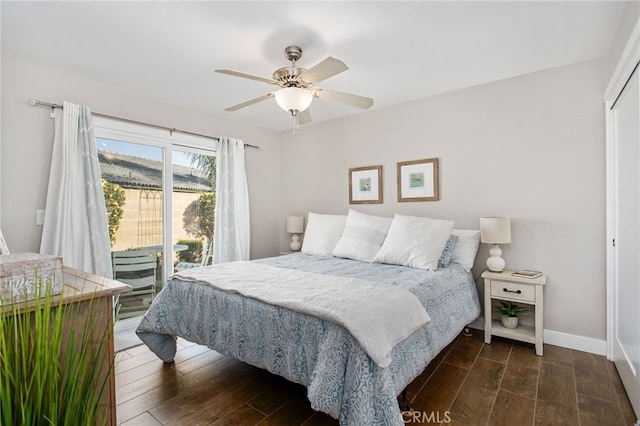 30249 Spray Dr, Canyon Lake, CA 92587 - bedroom with access to exterior, dark wood-style flooring, baseboards, and a ceiling fan