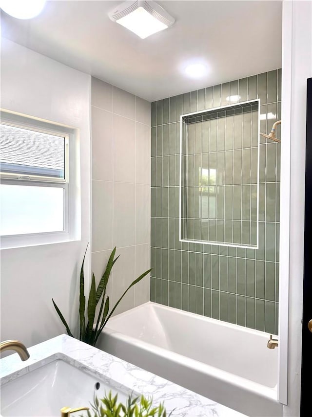 full bathroom with bathing tub / shower combination
