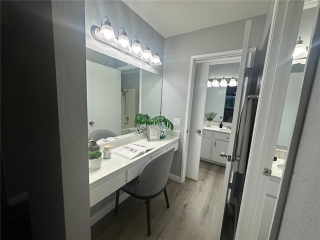 27130 Hidaway Ave Unit 6, Canyon Country, CA 91351 - full bathroom with wood finished floors and vanity