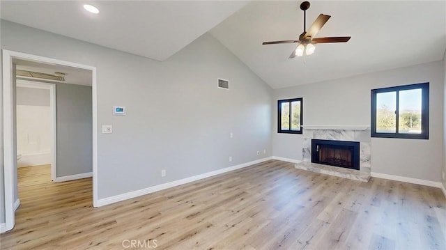 27130 Hidaway Ave Unit 6, Canyon Country, CA 91351 - unfurnished living room featuring light wood finished floors, baseboards, a fireplace, a ceiling fan, and recessed lighting