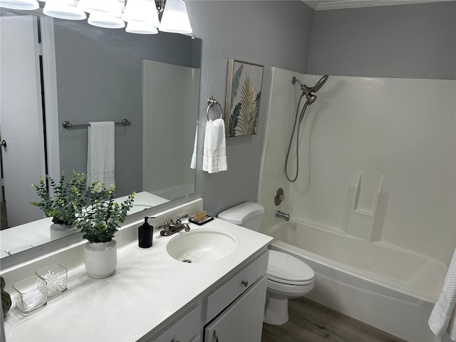 27130 Hidaway Ave Unit 6, Canyon Country, CA 91351 - full bath featuring toilet, vanity, shower / bath combination, wood finished floors, and ornamental molding