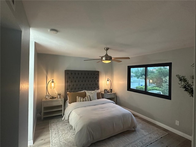 27130 Hidaway Ave Unit 6, Canyon Country, CA 91351 - bedroom featuring light wood finished floors, baseboards, and ceiling fan