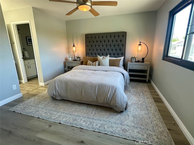 27130 Hidaway Ave Unit 6, Canyon Country, CA 91351 - bedroom featuring wood finished floors, baseboards, and ceiling fan