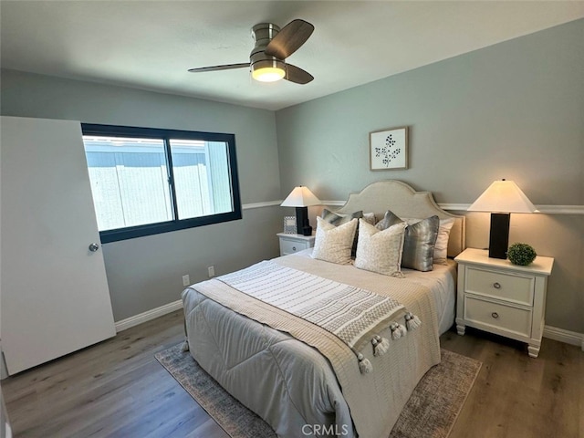 27130 Hidaway Ave Unit 6, Canyon Country, CA 91351 - bedroom with wood finished floors, baseboards, and ceiling fan