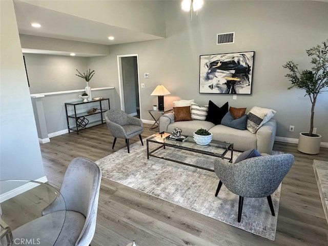 27130 Hidaway Ave Unit 6, Canyon Country, CA 91351 - living room featuring baseboards, wood finished floors, and recessed lighting