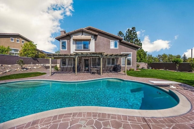 view of pool with a pergola, a patio area, a fenced backyard, a yard, and a fenced in pool