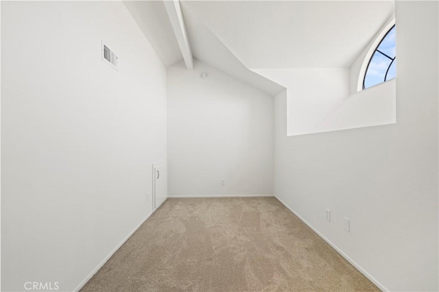 18217 Flynn Dr Unit 116, Canyon Country, CA 91387 - interior space featuring lofted ceiling with beams, carpet floors, baseboards, and visible vents