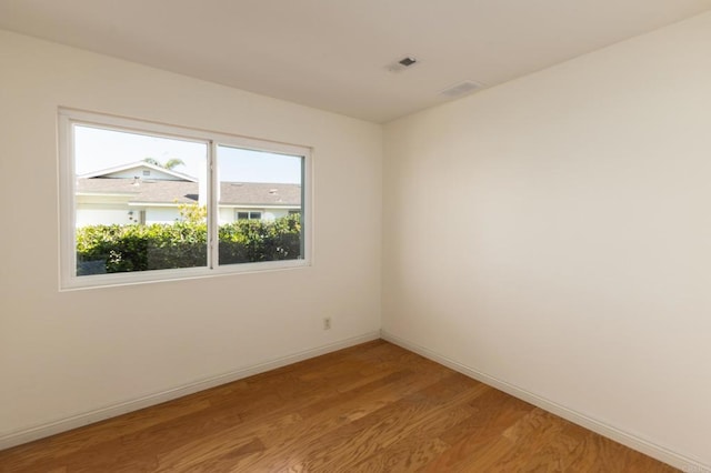 6462 Camino Del Parque, Carlsbad, CA 92011 - spare room featuring light wood-style flooring and baseboards