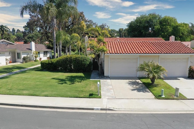 6462 Camino Del Parque, Carlsbad, CA 92011 - view of front facade with a tile roof, a front yard, a chimney, and concrete driveway