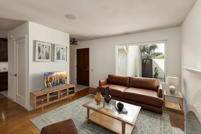 6462 Camino Del Parque, Carlsbad, CA 92011 - living area featuring wood finished floors and baseboards