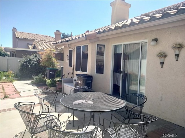 6353 Colonial Ave, Banning, CA 92220 - view of patio / terrace with fence and outdoor dining area