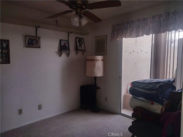 6353 Colonial Ave, Banning, CA 92220 - sitting room featuring a ceiling fan and carpet
