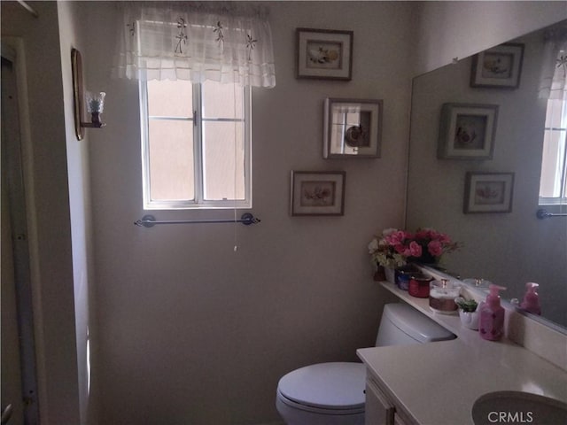 6353 Colonial Ave, Banning, CA 92220 - bathroom with toilet and vanity