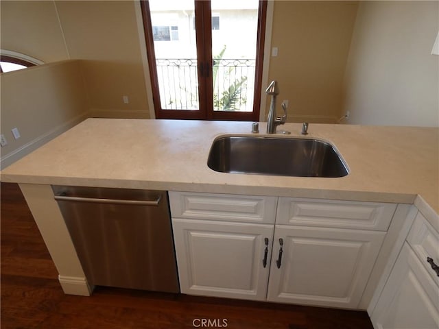 304 27th St, Manhattan Beach, CA 90266 - kitchen featuring dishwasher, light countertops, white cabinetry, and french doors