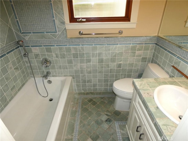 304 27th St, Manhattan Beach, CA 90266 - full bathroom featuring tile walls, a tub, vanity, and tile patterned floors