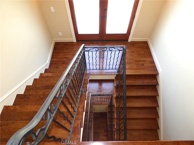 304 27th St, Manhattan Beach, CA 90266 - staircase with baseboards and french doors