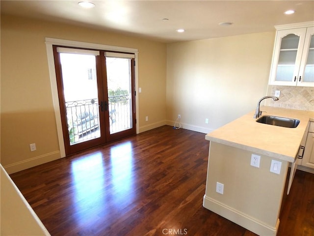 304 27th St, Manhattan Beach, CA 90266 - kitchen featuring a sink, french doors, white cabinets, light countertops, and recessed lighting