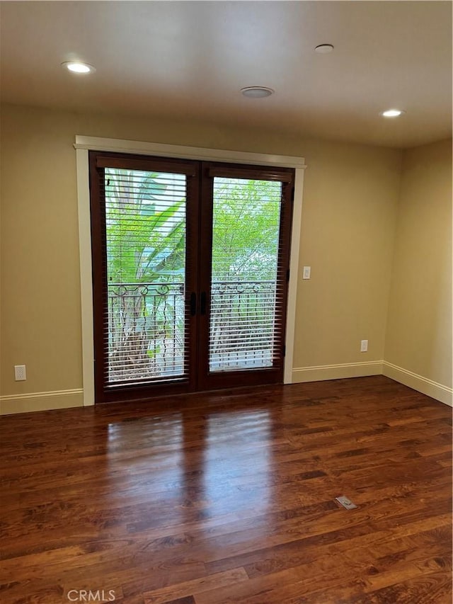 304 27th St, Manhattan Beach, CA 90266 - spare room with french doors, baseboards, recessed lighting, and wood finished floors