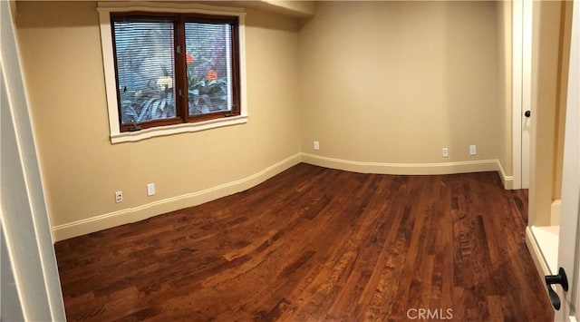 304 27th St, Manhattan Beach, CA 90266 - unfurnished room with baseboards and dark wood-style flooring